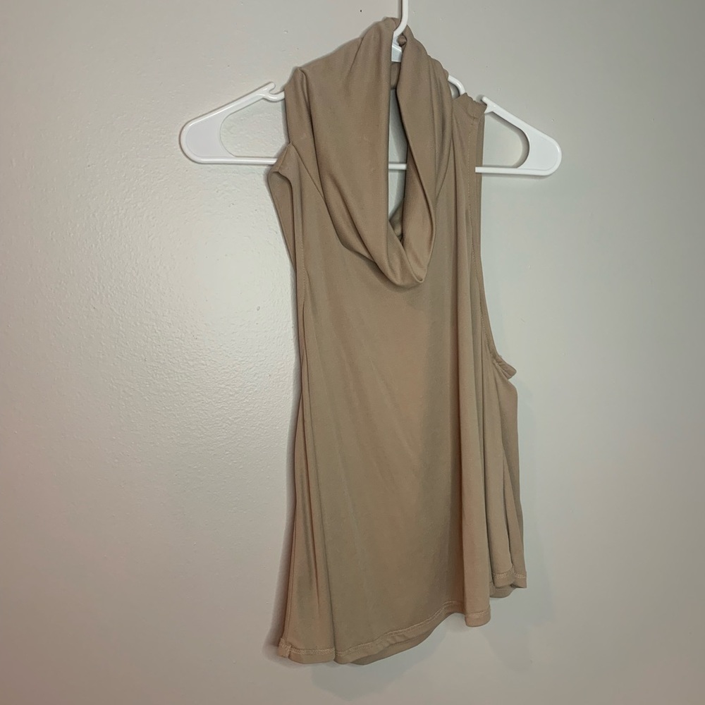 This is a tank top with a cowwel neck.